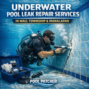 Professional repairing an underwater pool leak with specialized equipment in a residential pool.