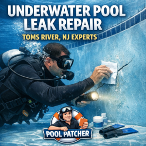 Technician performing underwater pool leak repair using specialized tools in a clear blue pool in Toms River, NJ.
