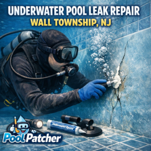 Technician performing underwater pool leak repair in a residential pool in Wall Township, NJ.