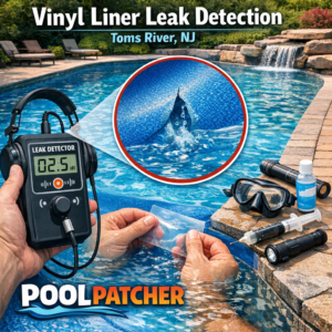 Technician inspecting a vinyl pool liner with leak detection equipment in a residential swimming pool in Toms River, NJ.
