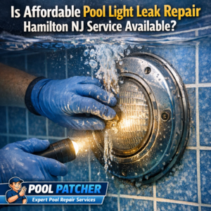 Close-up of a technician repairing a pool light leak with tools at a residential pool in Hamilton, NJ.