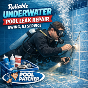 Technician repairing an underwater pool leak in Ewing, NJ using specialized equipment.